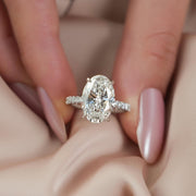 Oval cut lab grown diamond ring with tapered diamond shank in white gold